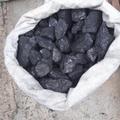 Каменный уголь в мешках